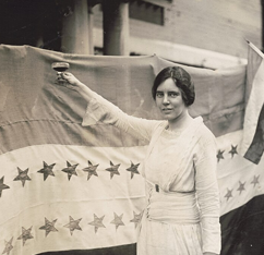 Alice Paul celebrates (with grape juice) the passing of the 19th Amendment